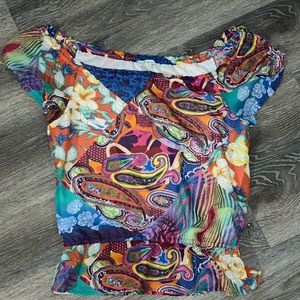 Cleo beautiful brightly colored top with elastic. Perfect for your next vacation